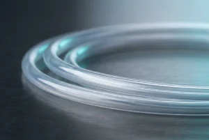 Custom PTFE tubing coil for endoscope working channels